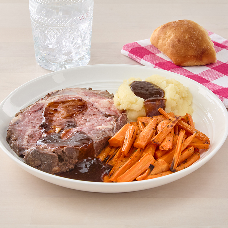 Prime Rib with Mashed Potatoes, Roasted Carrots, Gravy and Rolls