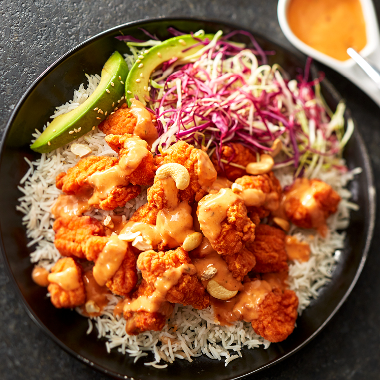 Curry Popcorn Chicken Bowls with Gochujang Ranch Dressing
