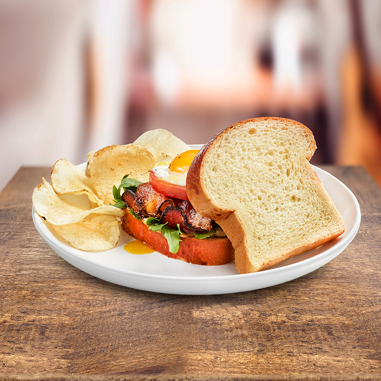 Egg, Bacon, Tomato & Arugula on Toasted Brioche