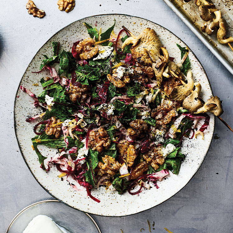 Chicories with Walnut Anchoiade, Goat Cheese, Mushroom Skewer and Burnt Onion Ash
