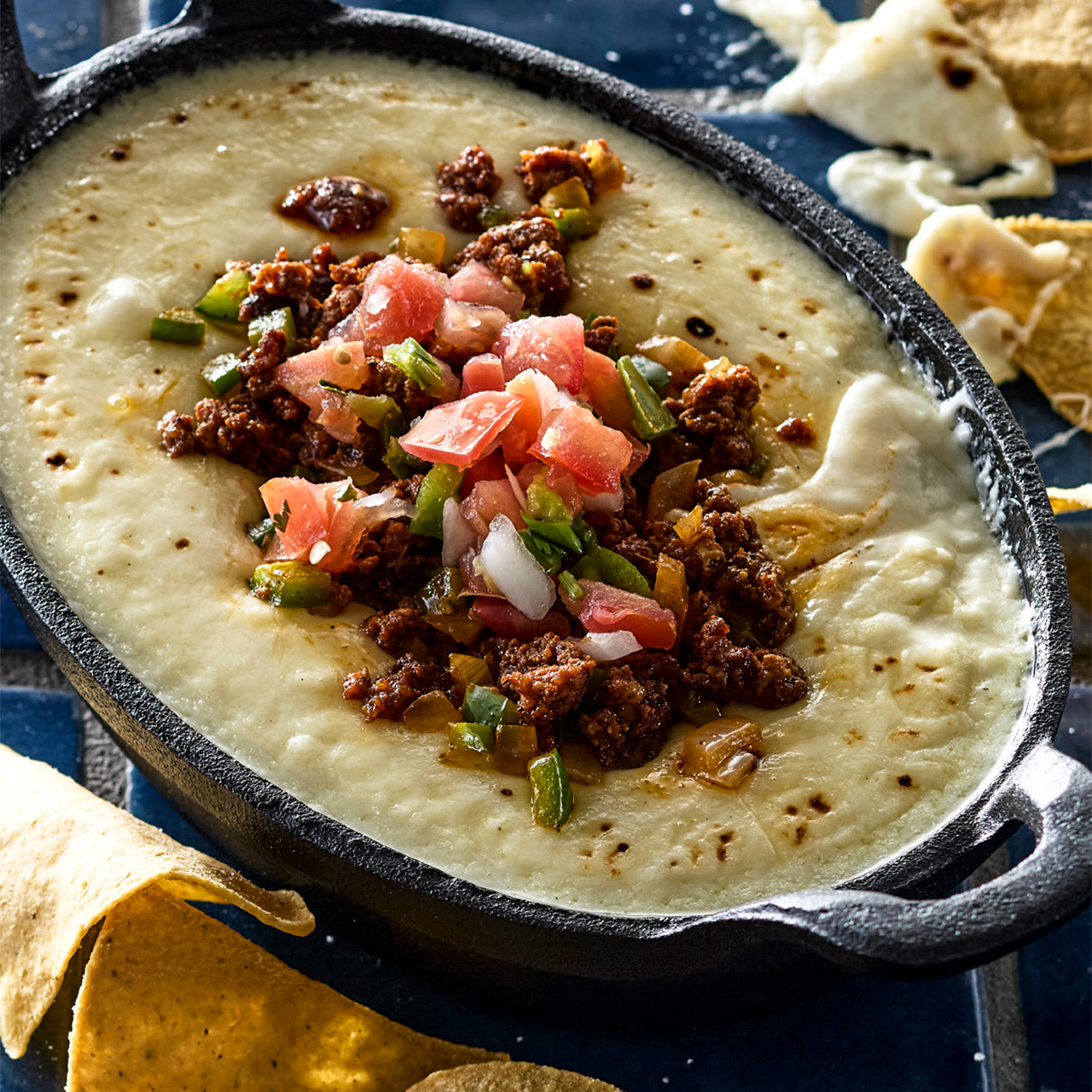 Three Cheese Queso Fundido with Chorizo and Pico de Gallo