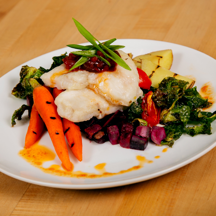 Tomato Jam-Crusted Wild Alaska Pollock with Brussels Sprout Ragout and Grilled Fingerling Potatoes
