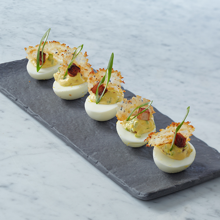 Spicy Deviled Eggs with Creole Crisp, Holy Trinity Mustard and Smoked Pork Belly