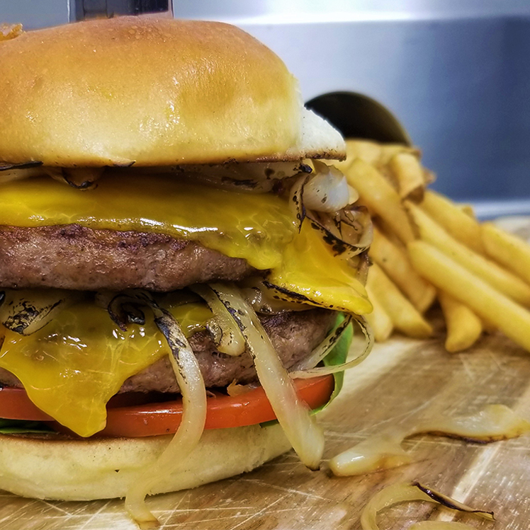 Double Brisket Steak Burger with Smoked Cheddar and Beer Braised Onions