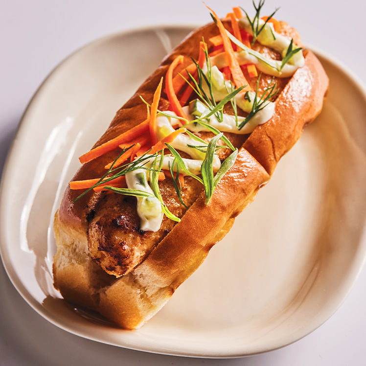 Seafood Dog with Fermented Garlic Tartar Sauce, Pickled Carrots and Dill