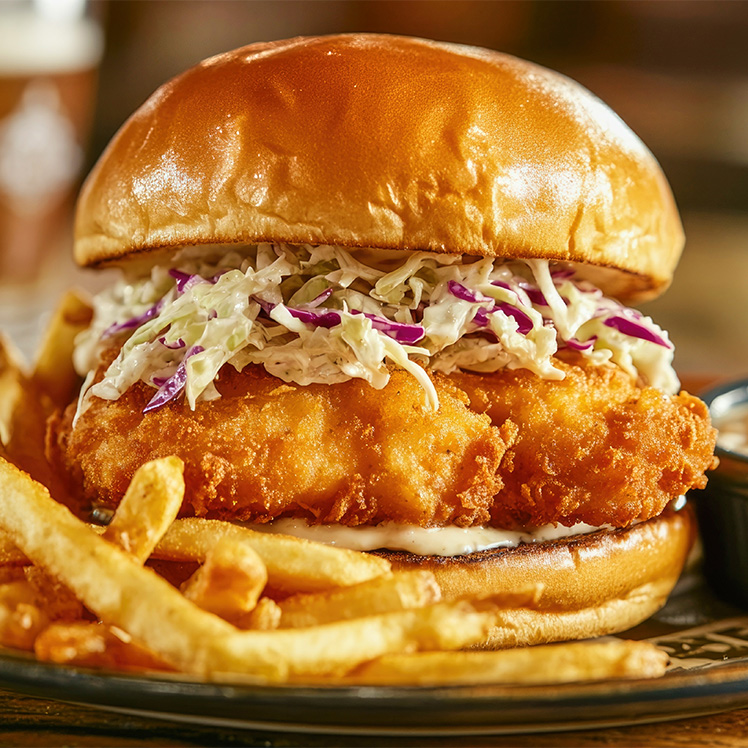 Beer Battered Pollock Sandwich with Spicy Pickle Slaw